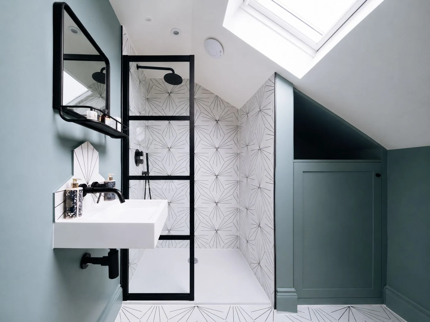Cope Place: The shower room arranged beneath the roof slope.