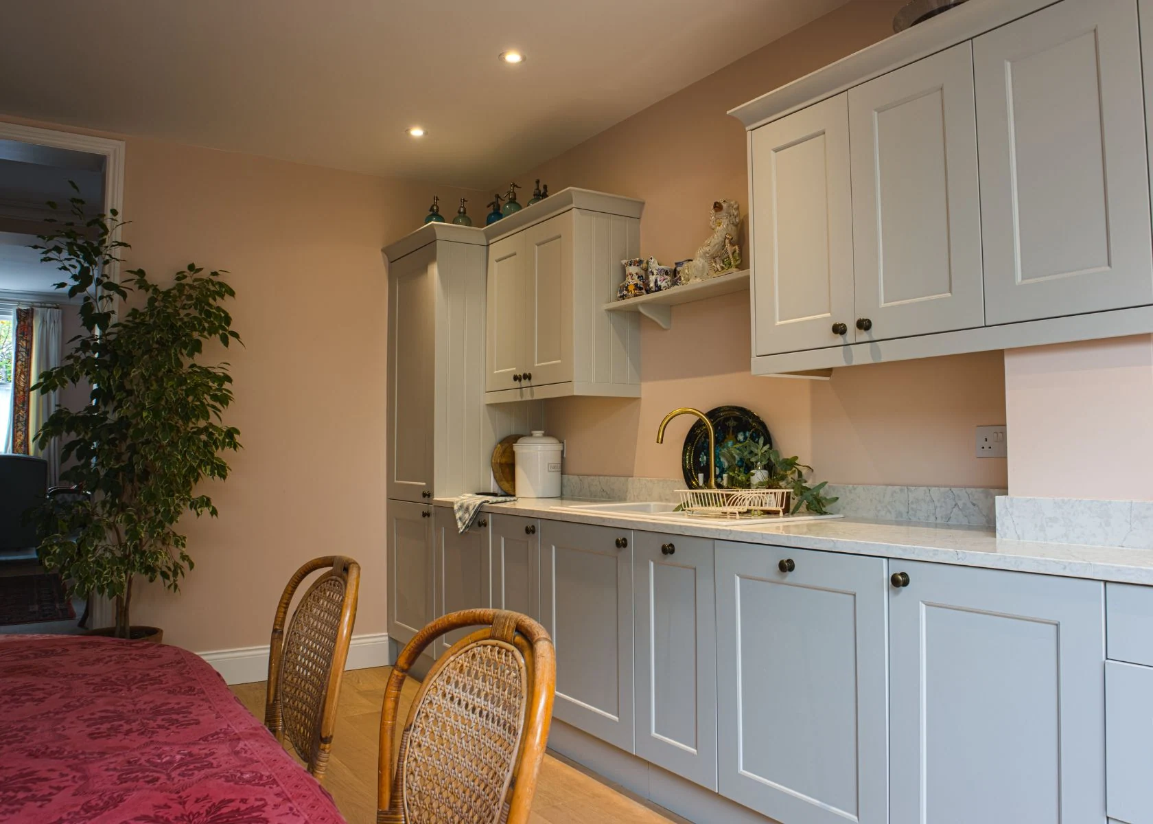 Faroe Road: Kitchen storage and the adjoining dining area.