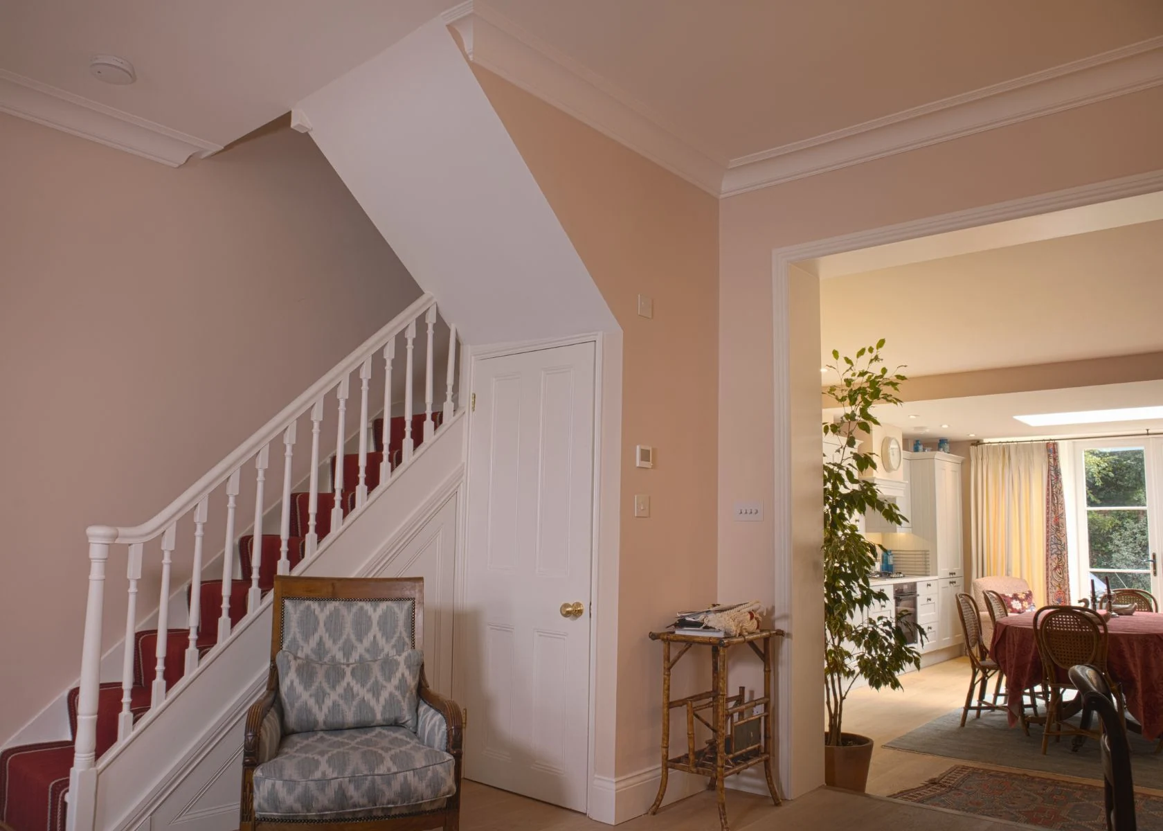 Faroe Road: The entrance hall connects the staircase and rear rooms.