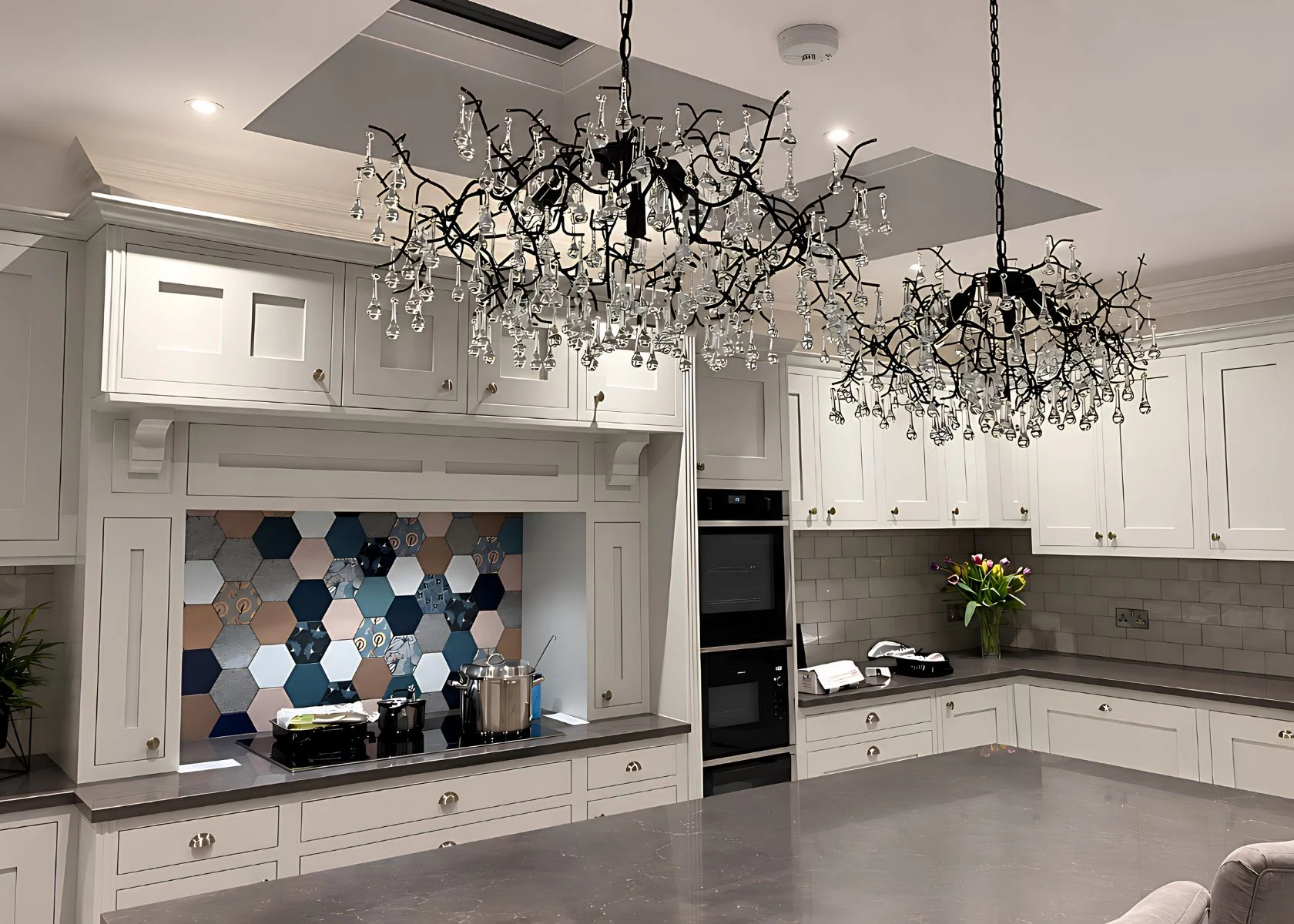 Queen Elizabeth: Kitchen layout, fitted cabinetry and ceiling lighting.