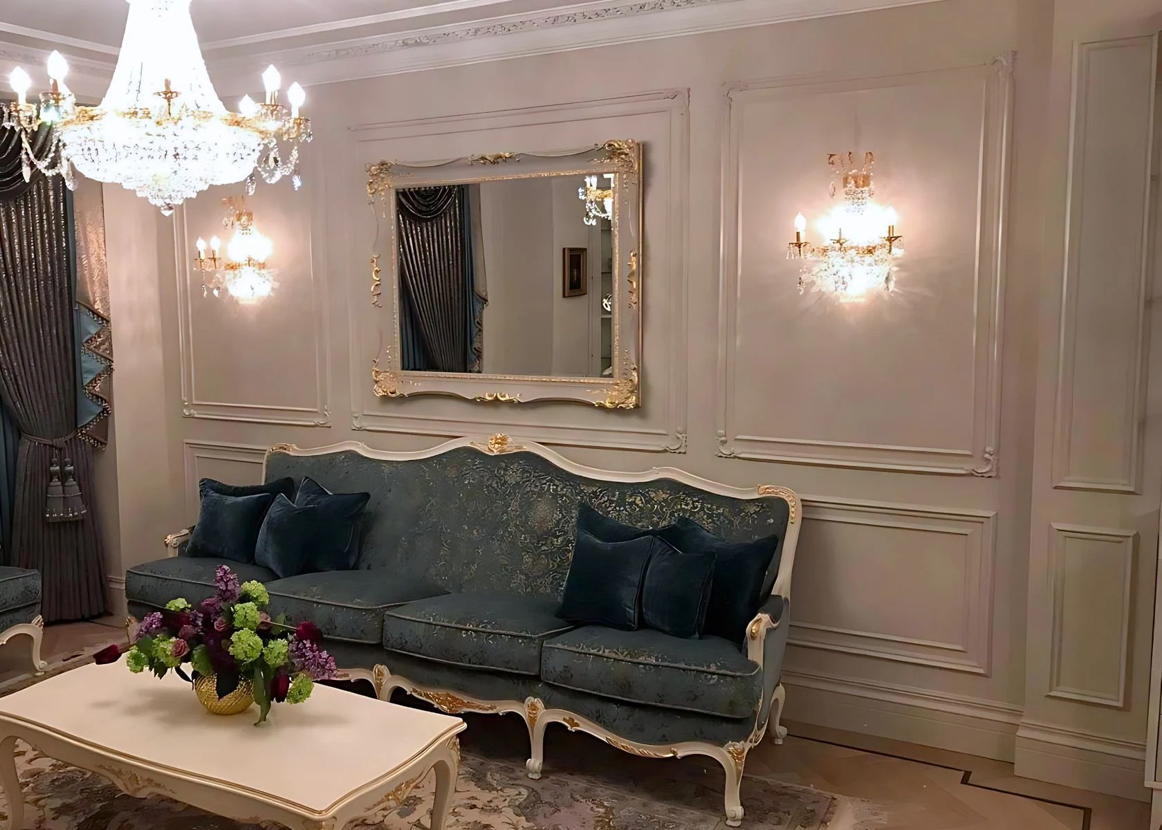 Queen Elizabeth: The living room with wall panelling and coordinated lighting.