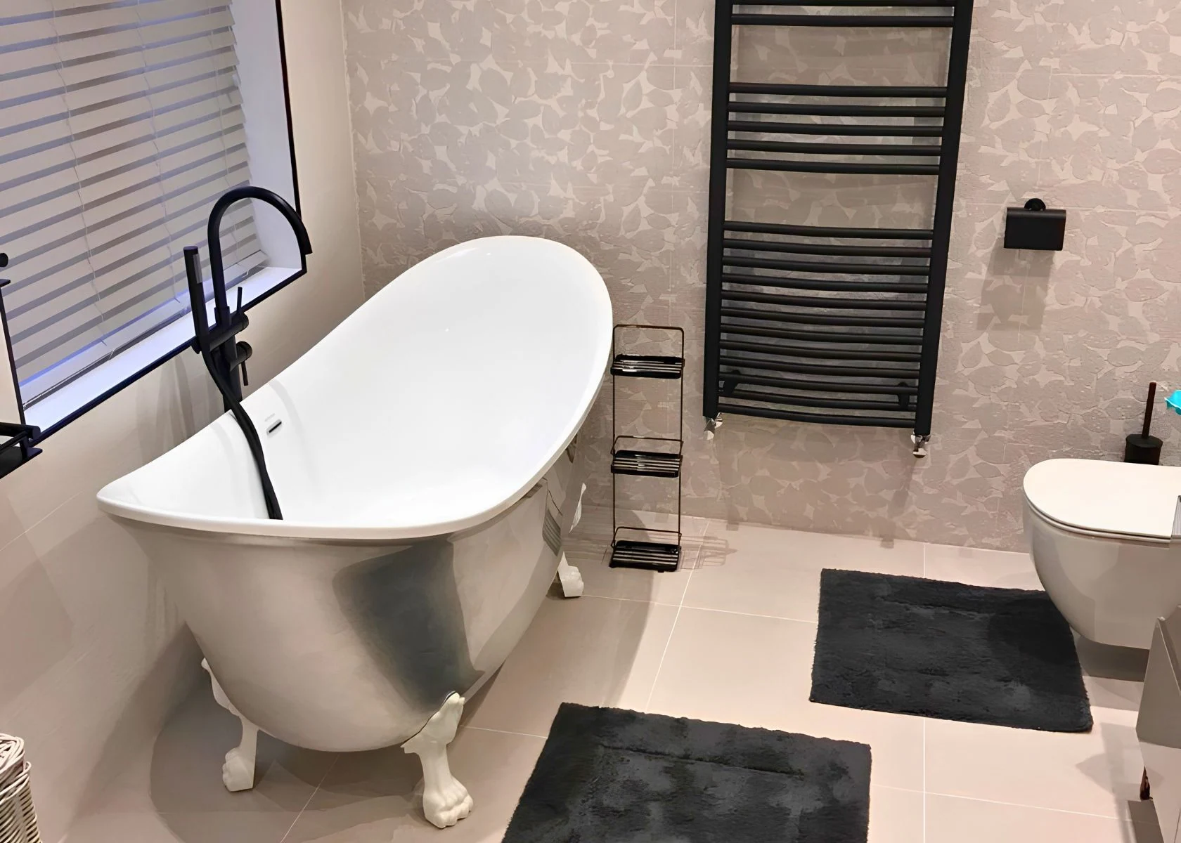 Queen Elizabeth: Bathroom layout with freestanding bath and shower.