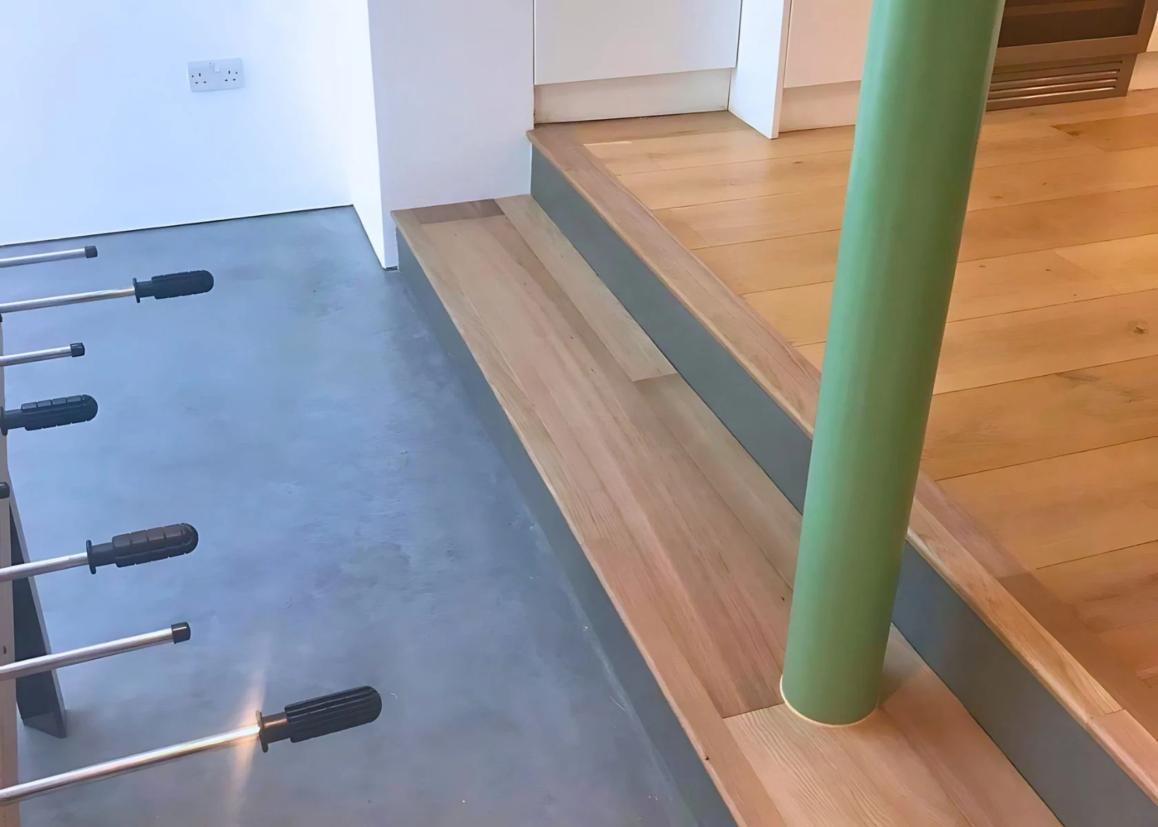 Riversdale Road: Steps connect the new floor level to the existing house.