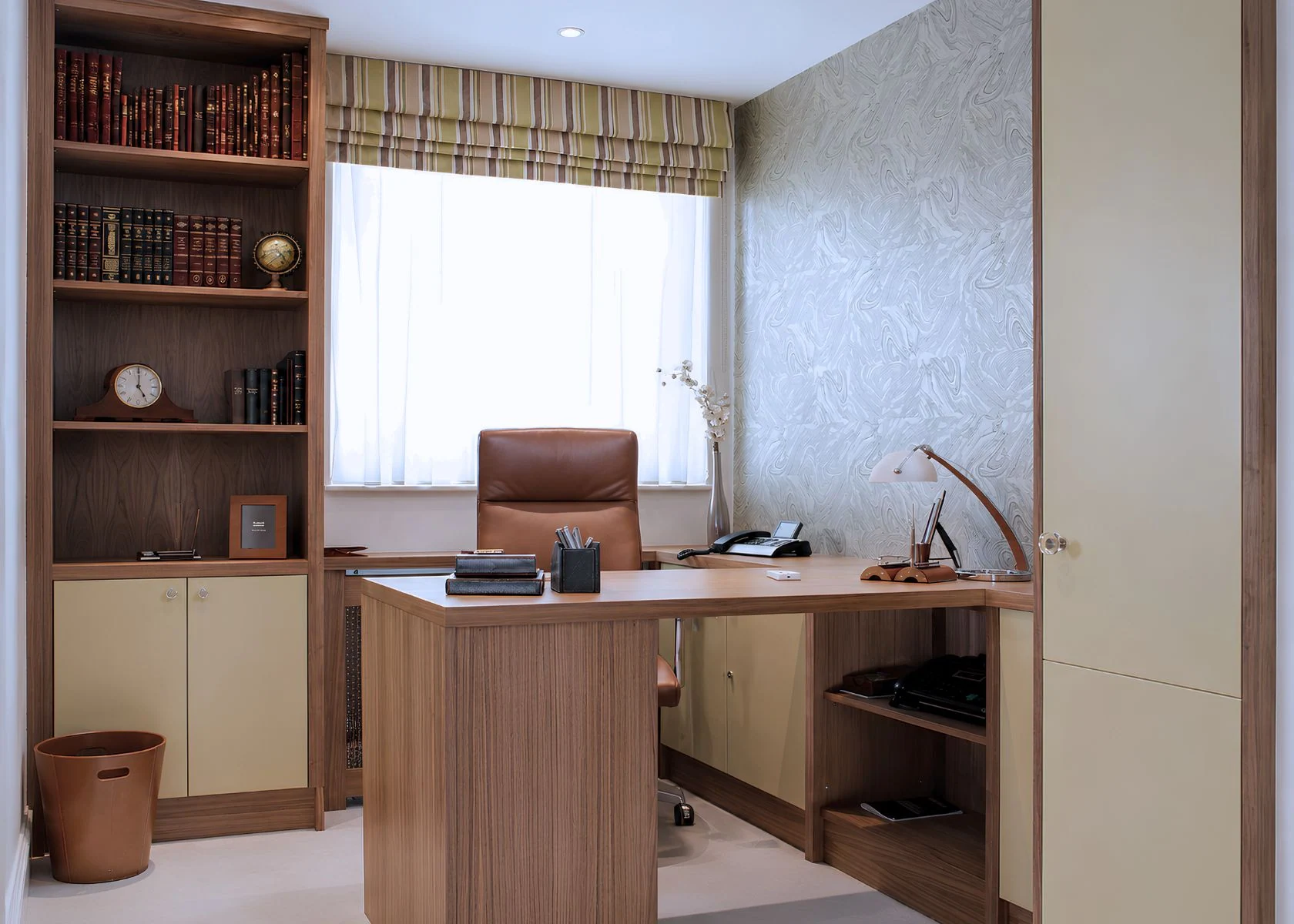 Rostrevor Avenue: Fitted study furniture and shelving around the desk.