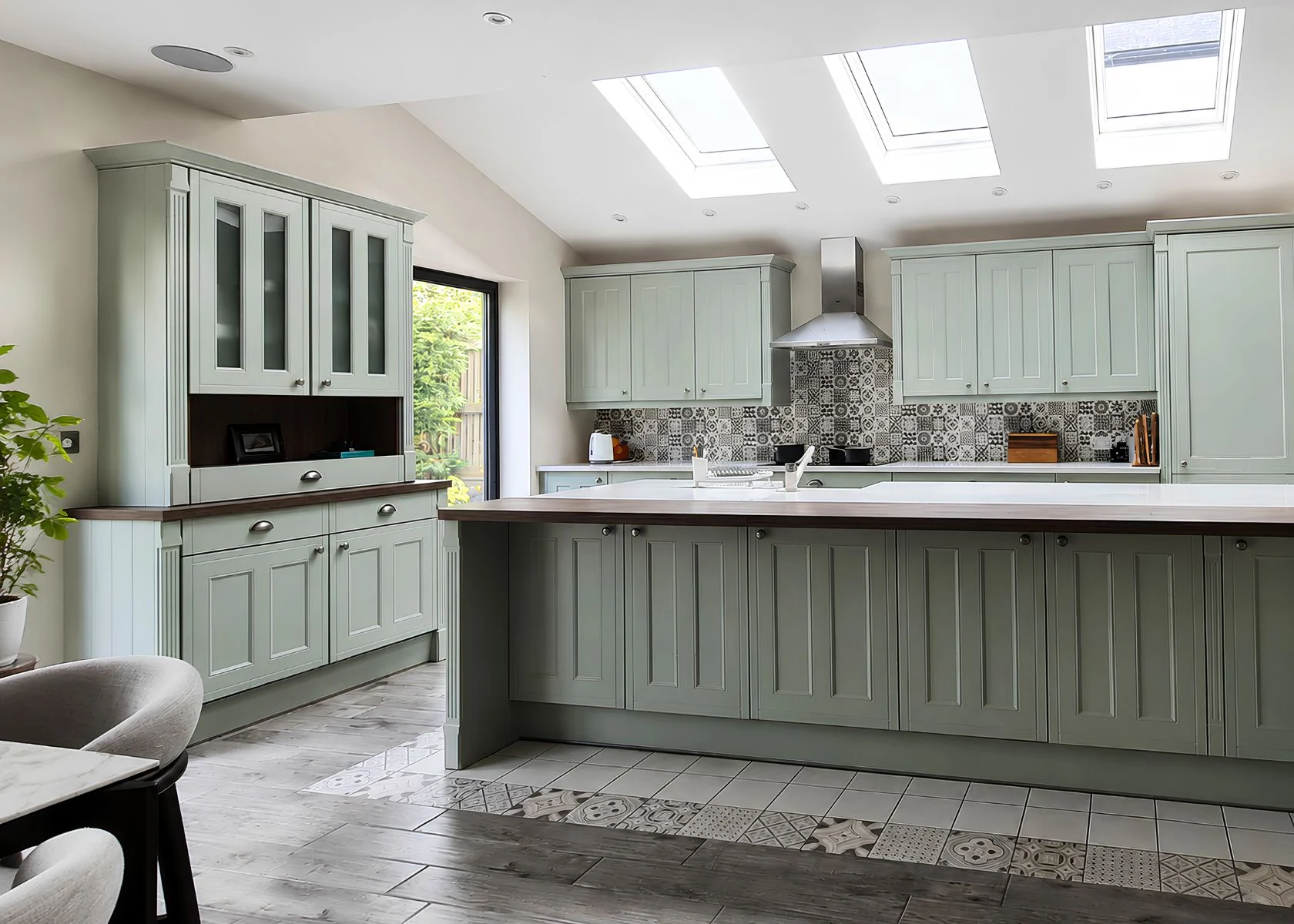 Sutton: The kitchen island beneath a row of rooflights.