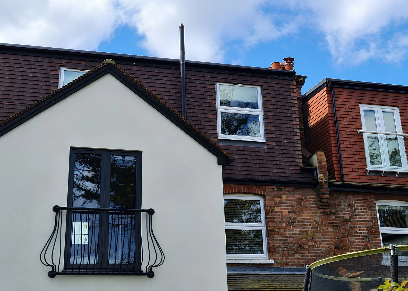 Sutton: The rear elevation and upper-floor roof accommodation.