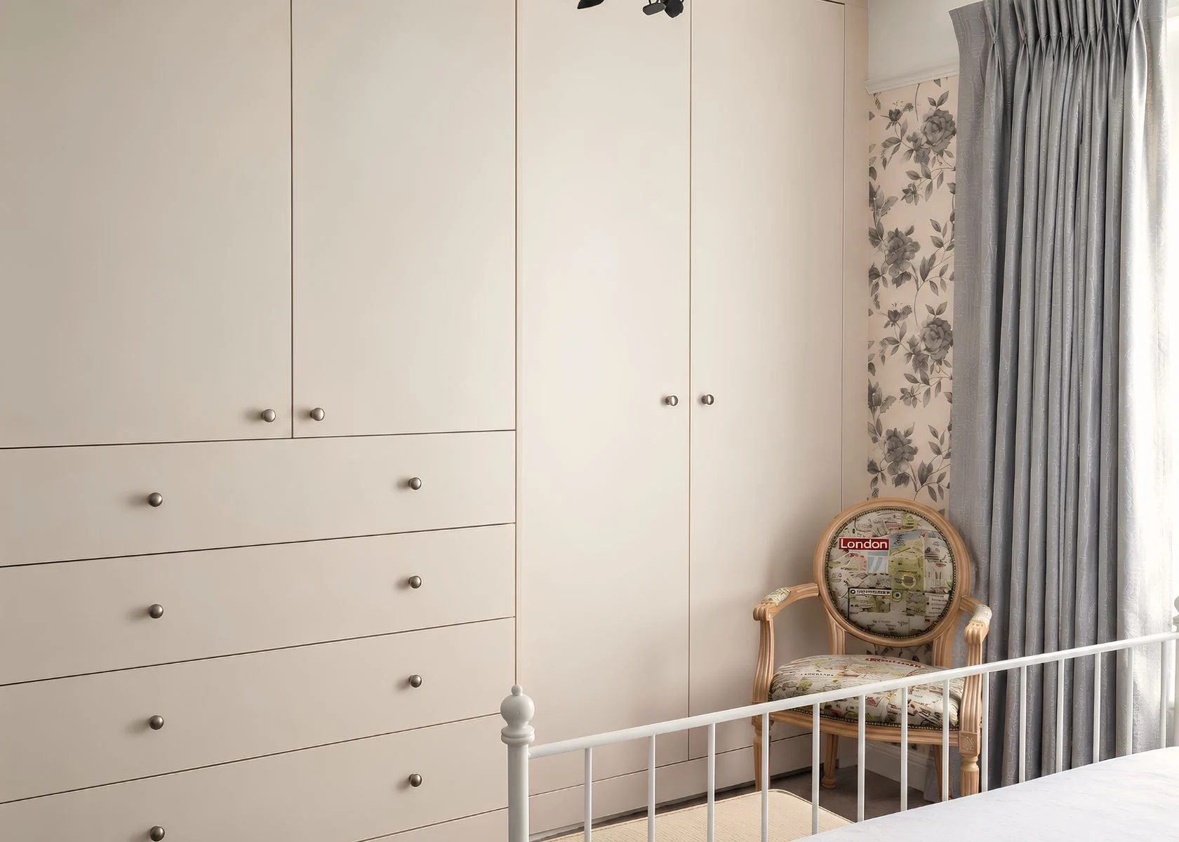 Sutton: Built-in wardrobes fitted to the bedroom wall.